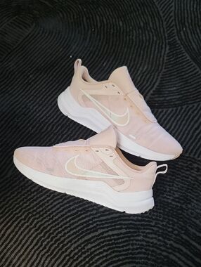 Nike Women’s Light Pink Mesh Running Sneakers with White Swoosh